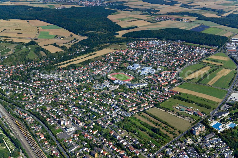 Gadheim from above - Residential areas on the edge of agricultural land in Gadheim in the state Bavaria, Germany