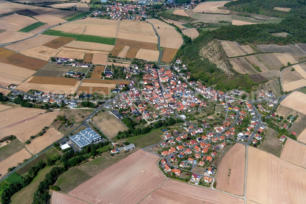 Heßdorf from the bird's eye view: Residential areas on the edge of agricultural land in Heßdorf in the state Bavaria, Germany