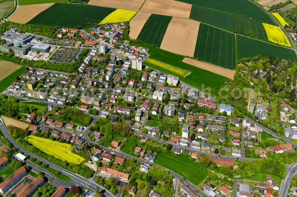 Kitzingen from the bird's eye view: Residential areas on the edge of agricultural land in Kitzingen in the state Bavaria, Germany