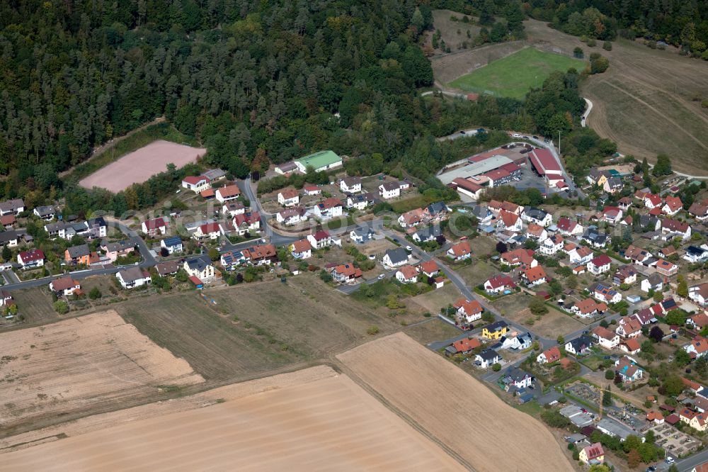 Neuendorf from the bird's eye view: Residential areas on the edge of agricultural land in Neuendorf in the state Bavaria, Germany