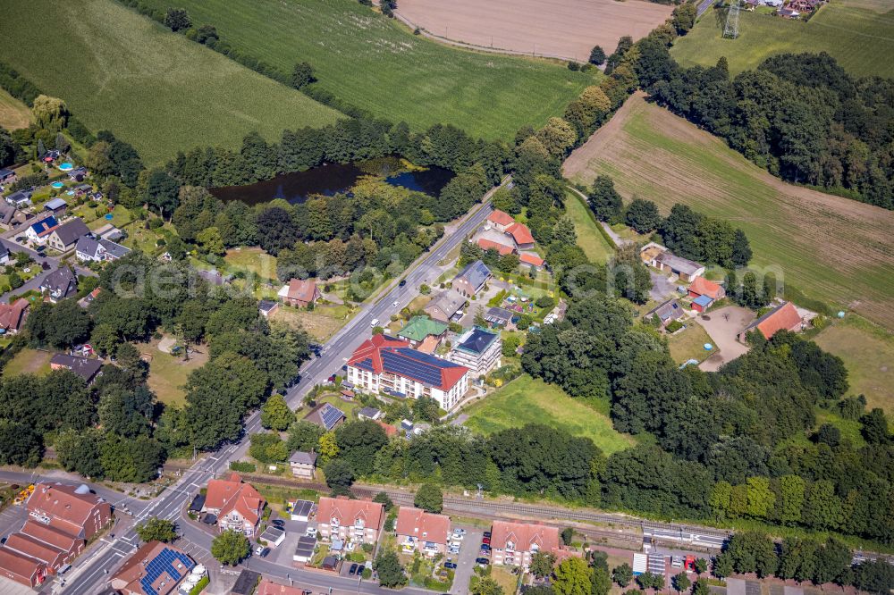 Rhade from the bird's eye view: Residential areas on the edge of agricultural land in Rhade in the state North Rhine-Westphalia, Germany