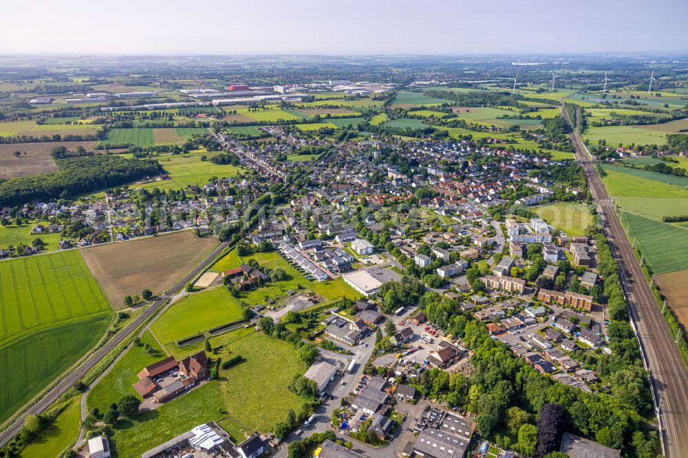 Aerial image Selmigerheide - Residential areas on the edge of agricultural land in Selmigerheide in the state North Rhine-Westphalia, Germany