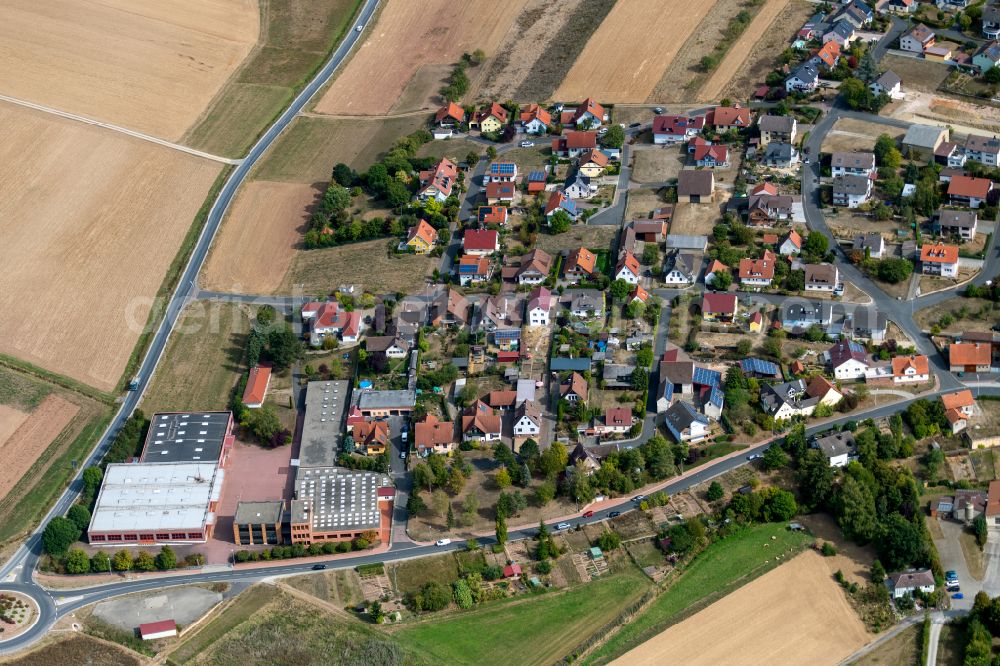 Aerial photograph Steinfeld - Residential areas on the edge of agricultural land in Steinfeld in the state Bavaria, Germany