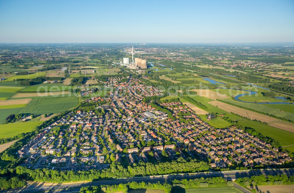 Stockum from the bird's eye view: Residential areas on the edge of agricultural land in Stockum at Ruhrgebiet in the state North Rhine-Westphalia, Germany