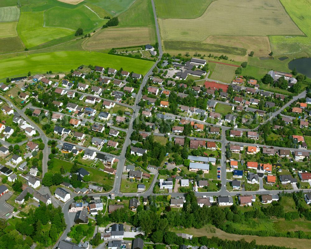 Aerial image Tauperlitz - Residential areas on the edge of agricultural land in Tauperlitz in the state Bavaria, Germany