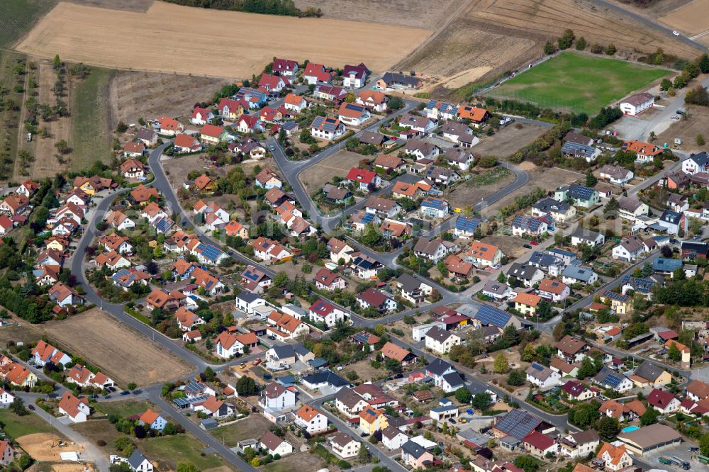 Aerial image Urspringen - Residential areas on the edge of agricultural land in Urspringen in the state Bavaria, Germany