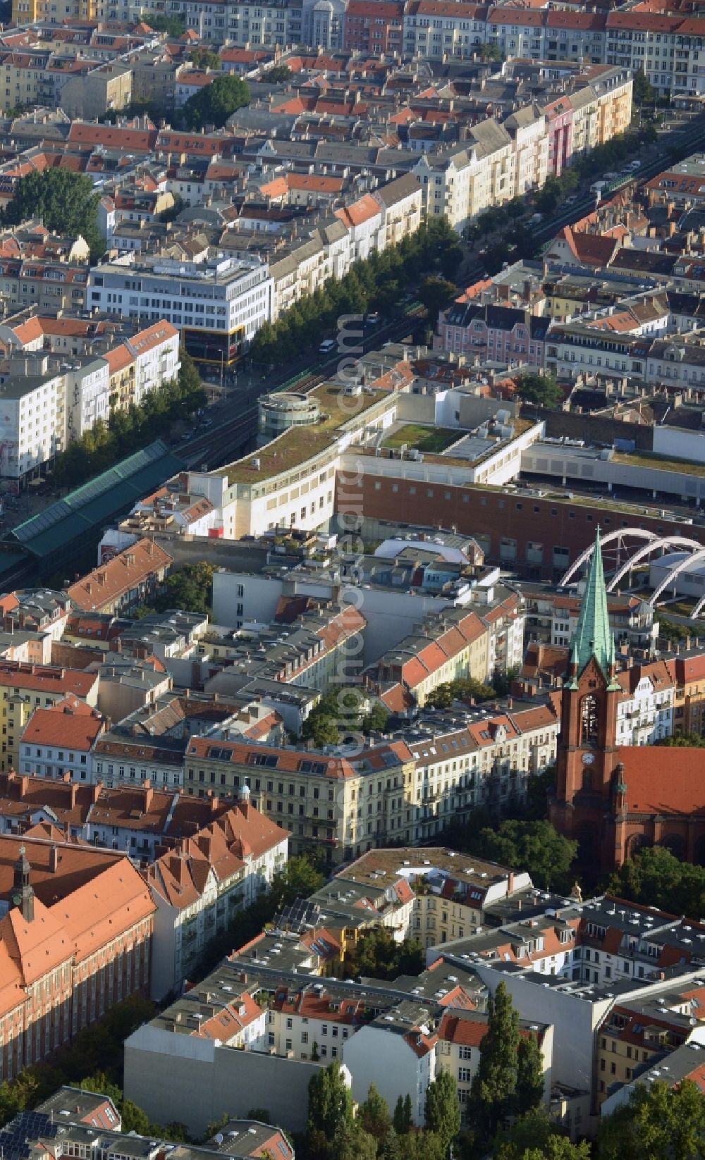 Berlin Prenzlauer Berg from the bird's eye view: Residential area at the Gethsemane Church at Stargarder street in Prenzlauer Berg district of Berlin. In the background, the mall Schoenhauser Allee Arcaden mfi management AG