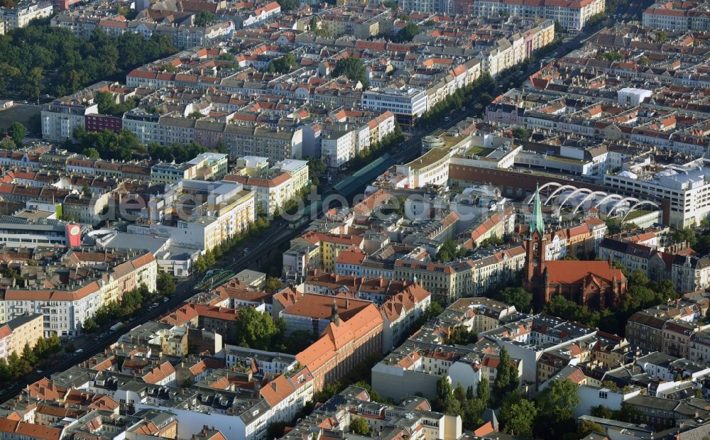 Aerial image Berlin Prenzlauer Berg - Residential area at the Gethsemane Church at Stargarder street in Prenzlauer Berg district of Berlin. In the background, the mall Schoenhauser Allee Arcaden mfi management AG