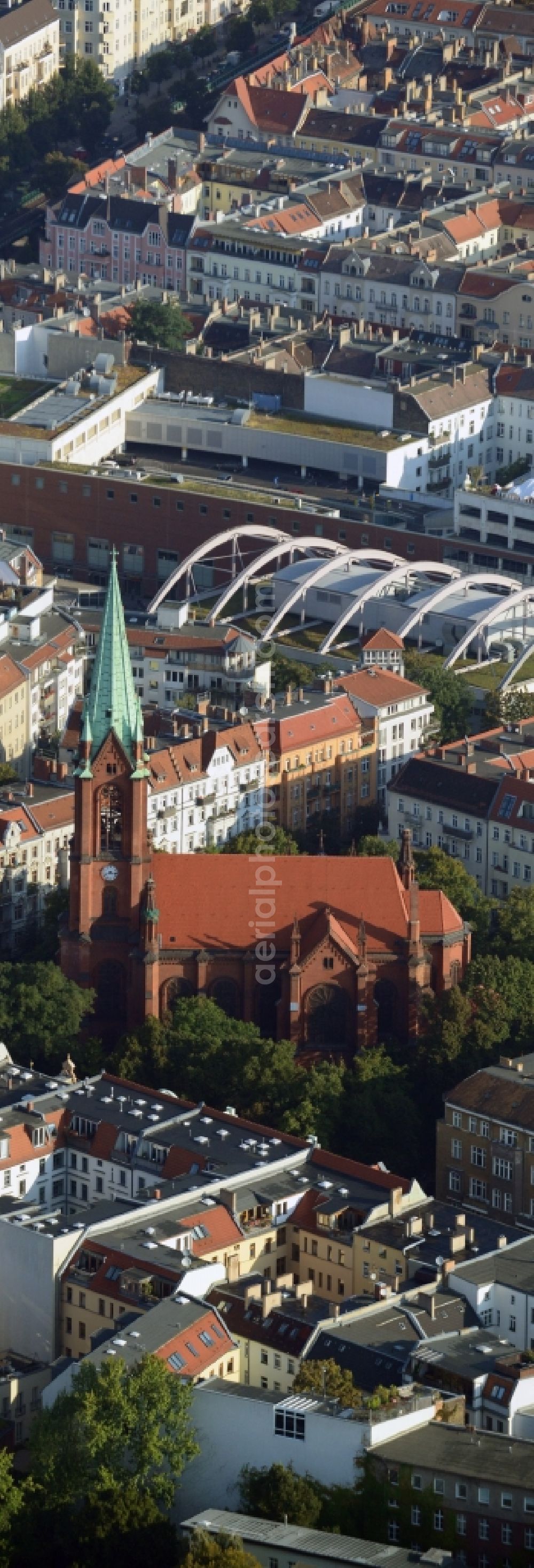 Berlin Prenzlauer Berg from the bird's eye view: Residential area at the Gethsemane Church at Stargarder street in Prenzlauer Berg district of Berlin. In the background, the mall Schoenhauser Allee Arcaden mfi management AG