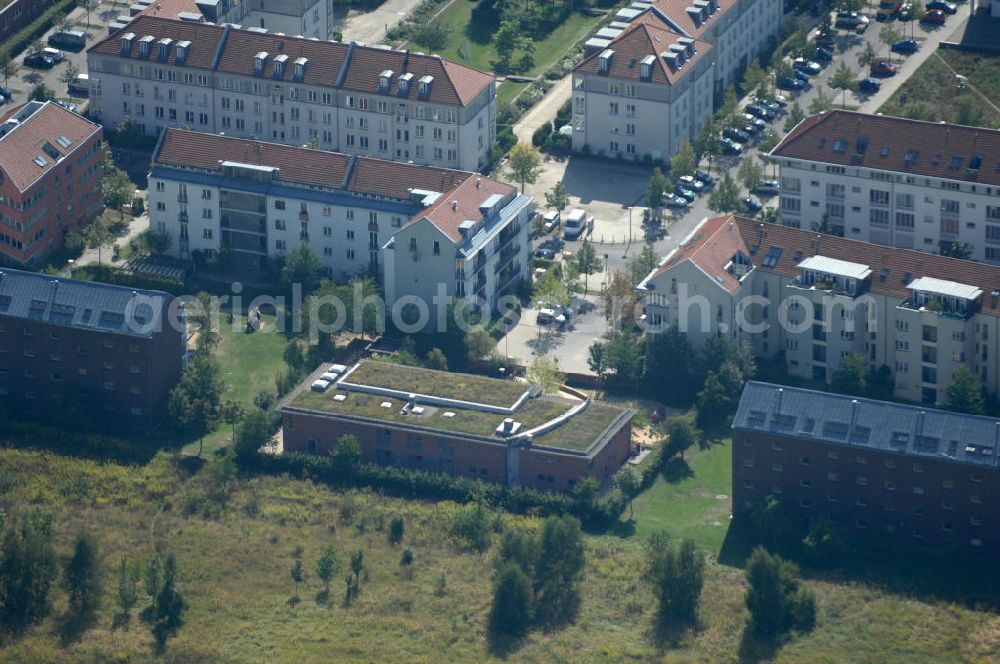 Aerial photograph Berlin - Blick auf Mehrfamilienhäuser an der Pfannschmidtstraße im Wohngebiet / Neubaugebiet Karow-Nord.