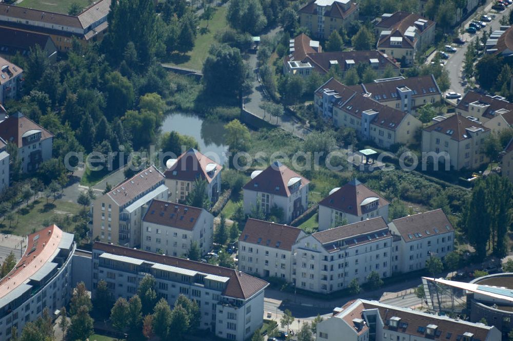 Aerial photograph Berlin - Blick auf Mehrfamilienhäuser an der Achillesstraße Ecke Röländer Straße im Wohngebiet / Neubaugebiet Karow-Nord.