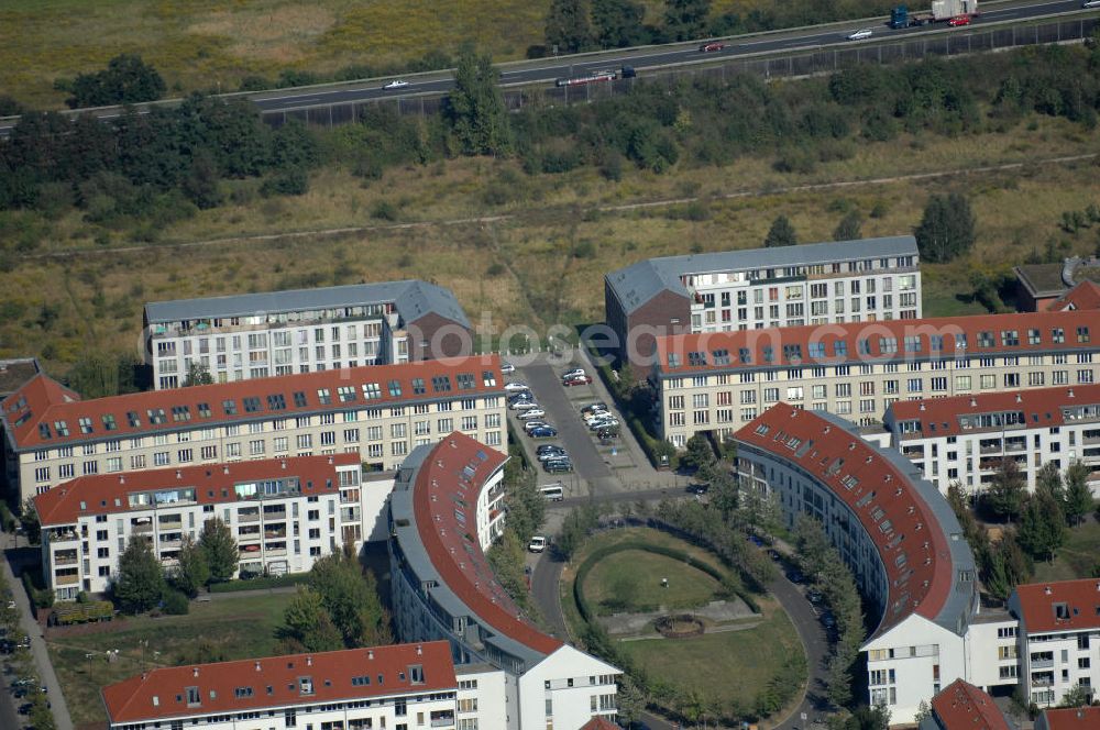 Aerial photograph Berlin - Blick auf Mehrfamilienhäuser am Ballonplatz Ecke Pfannschmidtstraße im Wohngebiet / Neubaugebiet Karow-Nord.