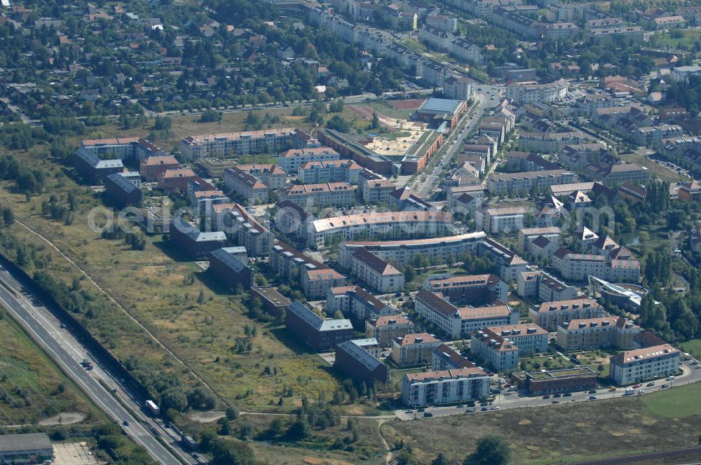 Aerial photograph Berlin - Blick auf Mehrfamilienhäuser um den Ballonplatz im Wohngebiet / Neubaugebiet Karow-Nord.