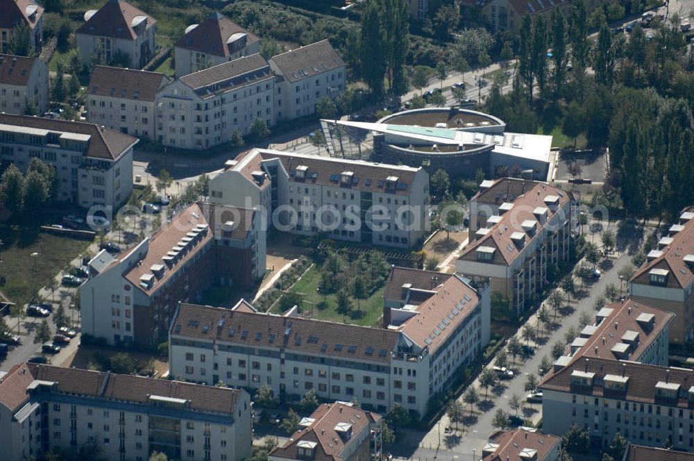 Aerial photograph Berlin - Blick auf Mehrfamilienhäuser an der Pfannschmidtstraße Ecke Achillesstraße Ecke Röländer Straße im Wohngebiet / Neubaugebiet Karow-Nord.