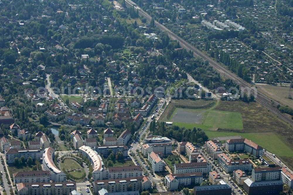 Aerial photograph Berlin - Blick auf Mehrfamilienhäuser an der Pfannschmidtstraße Ecke Busonistraße Ecke Achillesstraße Ecke Karestraße Ecke Ballonplatz Ecke Röländer Straße im Wohngebiet / Neubaugebiet Karow-Nord.