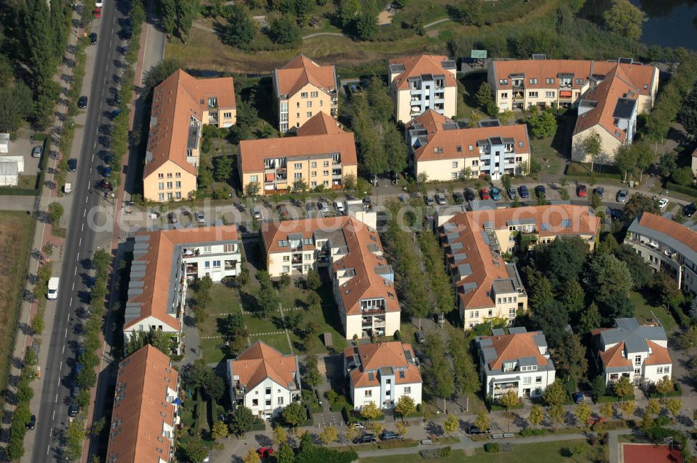 Berlin from the bird's eye view: Blick auf Mehrfamilienhäuser am Achtrutenberg Ecke Gewanneweg Ecke Röländer Straße im Wohngebiet / Neubaugebiet Karow-Nord.