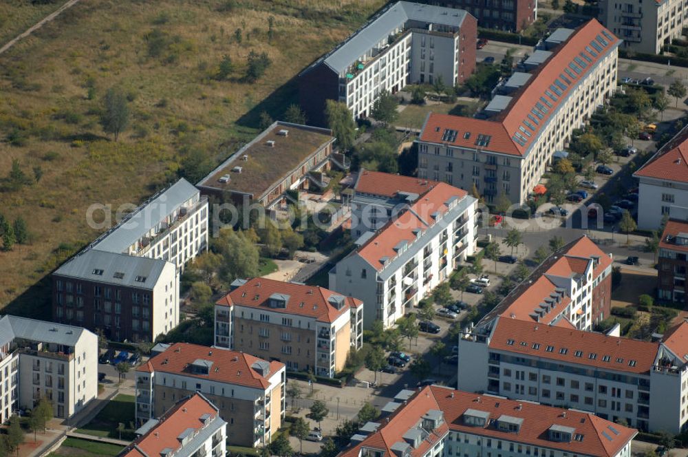 Berlin from the bird's eye view: Blick auf Mehrfamilienhäuser und Kita / Kindertagesstätte / Kindergarten an der Pfannschmidtstraße im Wohngebiet / Neubaugebiet Karow-Nord.