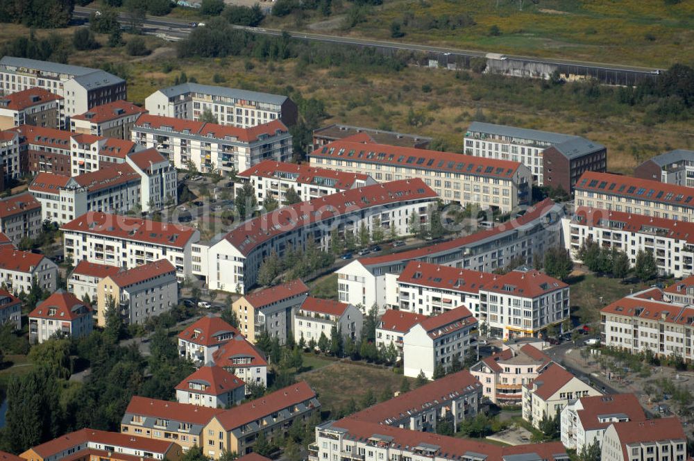 Aerial photograph Berlin - Blick auf Mehrfamilienhäuser an der Busonistraße Ecke Achillesstraße Ecke Ballonplatzam Ballonplatz im Wohngebiet / Neubaugebiet Karow-Nord.