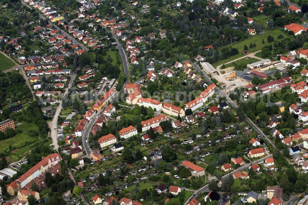 Apolda from above - The August-Berger-Strasse leaves to the west of the city Apolda in Thuringia. This residential area has several buildings from single family homes, multi-family homes and extensive green areas with small garden divisions