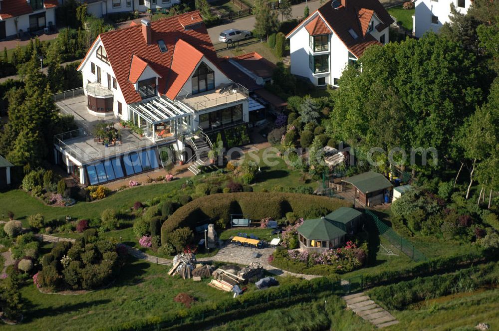 Aerial photograph Graal-Müritz - Blick auf das Wohngebiet Koppenheide der HAWO Bauträger KG in unmittelbarer Strandnähe im Ostseeheilbad Graal-Müritz. Es ist ein von 1996 bis 2004 neu errichtetes Wohngebiet mit insgesamt 210 Wochenend- und diverse Einzelhäusern in naturnahe Lage am Landschaftsschutzgebiet “Tabakwiesen” und nur wenige Minuten vom Ortszentrum entfernt.