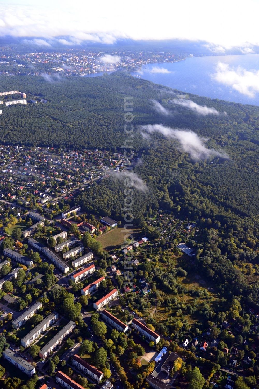 Berlin from the bird's eye view: View of a residential area at Koepenzeile, allot settlements and the city forest at the banks of the Lake Grosser Mueggelsee in autumnal Berlin - Koepenick