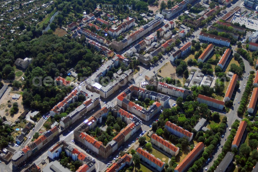 Möckern from the bird's eye view: Blick auf das Wohngebiet an der Georg-Schumann-Str. / Ecke Christoph-Probst-Str. in Möckern. Möckern ist eine Kleinstadt mit einer über 1000-jährigen Geschichte. Zwischen Magdeburg und Berlin liegt Möckern im Jerichower Land. Westlich erstrecken sich ausgedehnte Ackerflächen mit eingestreuten Baum- und Buschreihen bis zu den Ufern der Elbe vor der Landeshauptstadt Magdeburg. Sehenswürdigkeiten sind u.a. die St.-Laurentius-Kirche und das Schloss Möckern mit Englischem Landschaftspark.