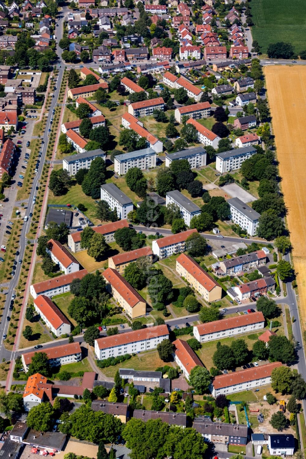 Aerial image Ahlen - Residential area of a multi-family house settlement at the Buergermeister-Corneli-Ring in Ahlen in the state North Rhine-Westphalia, Germany