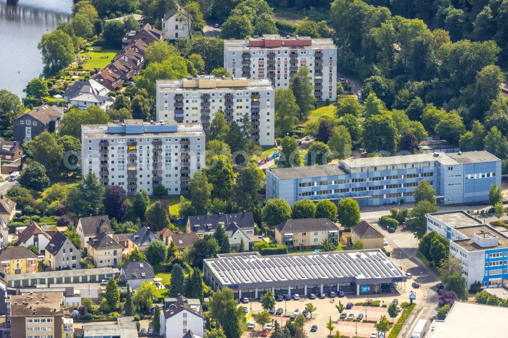 Essen from the bird's eye view: Residential area of the multi-family house settlement with ALDI Supermarkt on street Werdener Strasse in the district Kettwig in Essen at Ruhrgebiet in the state North Rhine-Westphalia, Germany