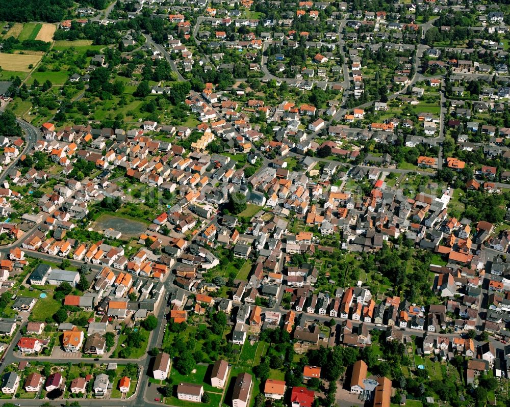 Alten-Buseck from the bird's eye view: Residential area of the multi-family house settlement in Alten-Buseck in the state Hesse, Germany