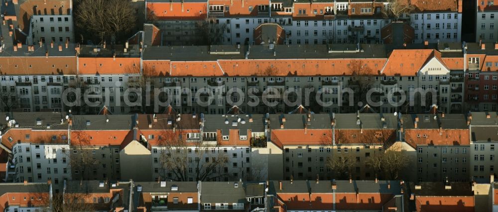 Berlin from above - Roof and wall structures in residential area of a multi-family house settlement on Sonnenallee destrict Neukoelln in Berlin in Germany