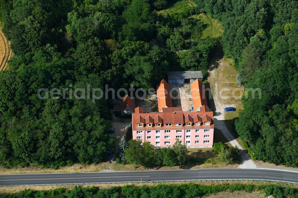 Aerial image Falkenberg - Residential area of the multi-family house settlement on federal street B 167 in Falkenberg in the state Brandenburg, Germany