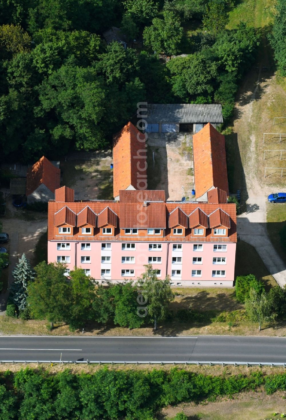 Aerial photograph Falkenberg - Residential area of the multi-family house settlement on federal street B 167 in Falkenberg in the state Brandenburg, Germany