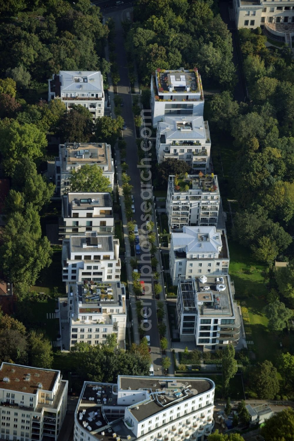 Berlin from the bird's eye view: Residential area of a multi-family house settlement in Clara-Wieck-Strasse in the Tiergarten part of Berlin in Germany. The apartment houses are surrounded by parks and embassies