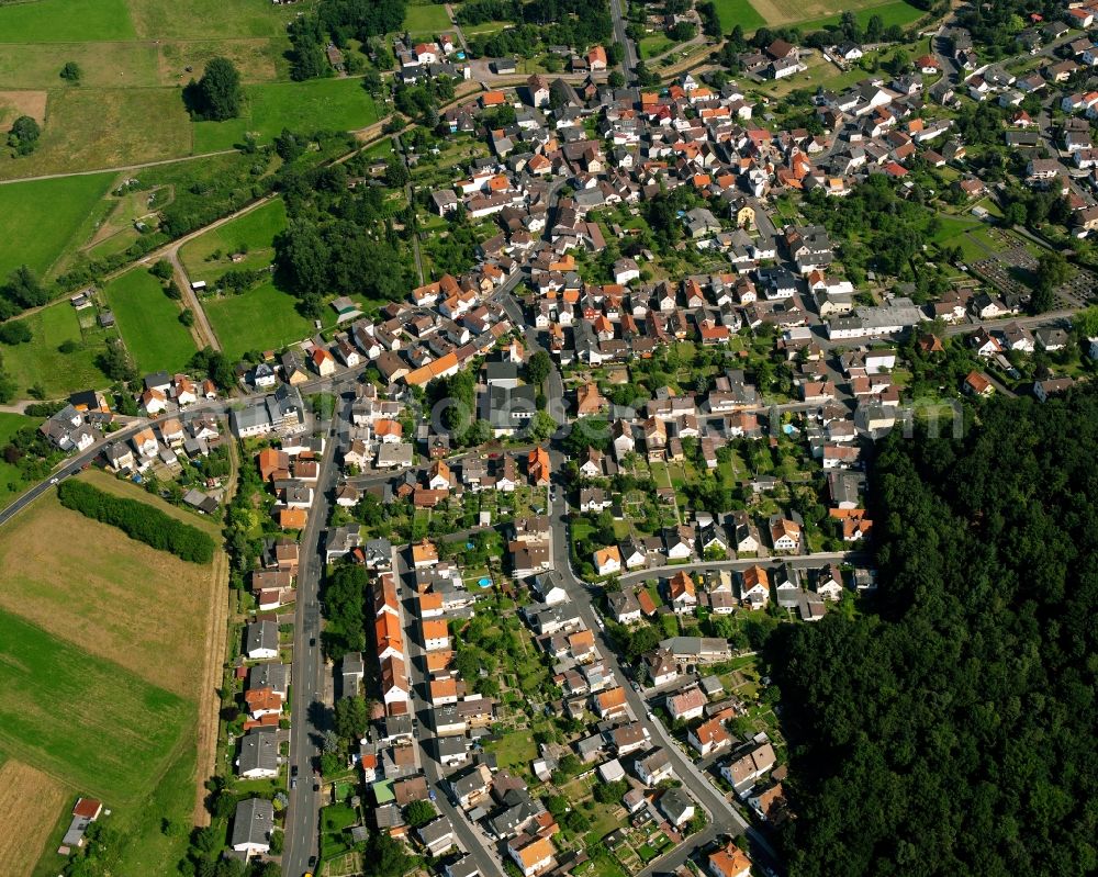 Daubringen from the bird's eye view: Residential area of the multi-family house settlement in Daubringen in the state Hesse, Germany