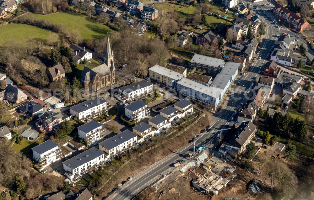 Witten from above - Residential area of the multi-family house settlement and the Evangelische Kirche Bommern on Rigeikenstrasse in Witten in the state North Rhine-Westphalia, Germany