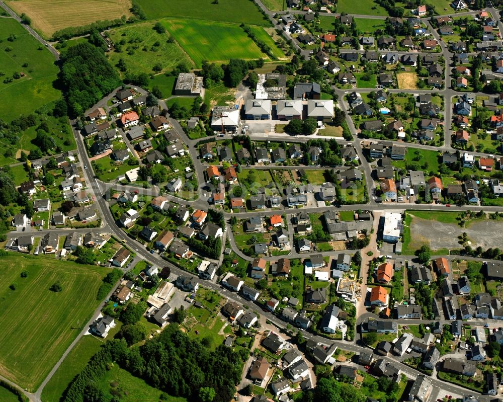 Frickhofen from the bird's eye view: Residential area of the multi-family house settlement in Frickhofen in the state Hesse, Germany