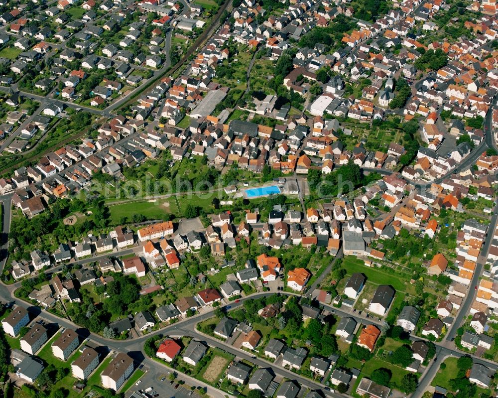 Großen-Buseck from the bird's eye view: Residential area of the multi-family house settlement in Großen-Buseck in the state Hesse, Germany