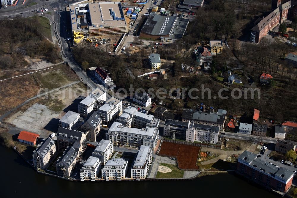 Aerial image Potsdam - Overlooking the historic town on the banks of the Havel memory of Potsdam, the state capital of Brandenburg. The area is being rebuilt by the company Prince of Prussia Grundbesitz AG, Speicherstadt GmbH, the Grothe group and Pro Potsdam. Here emerged condominiums and rental apartments