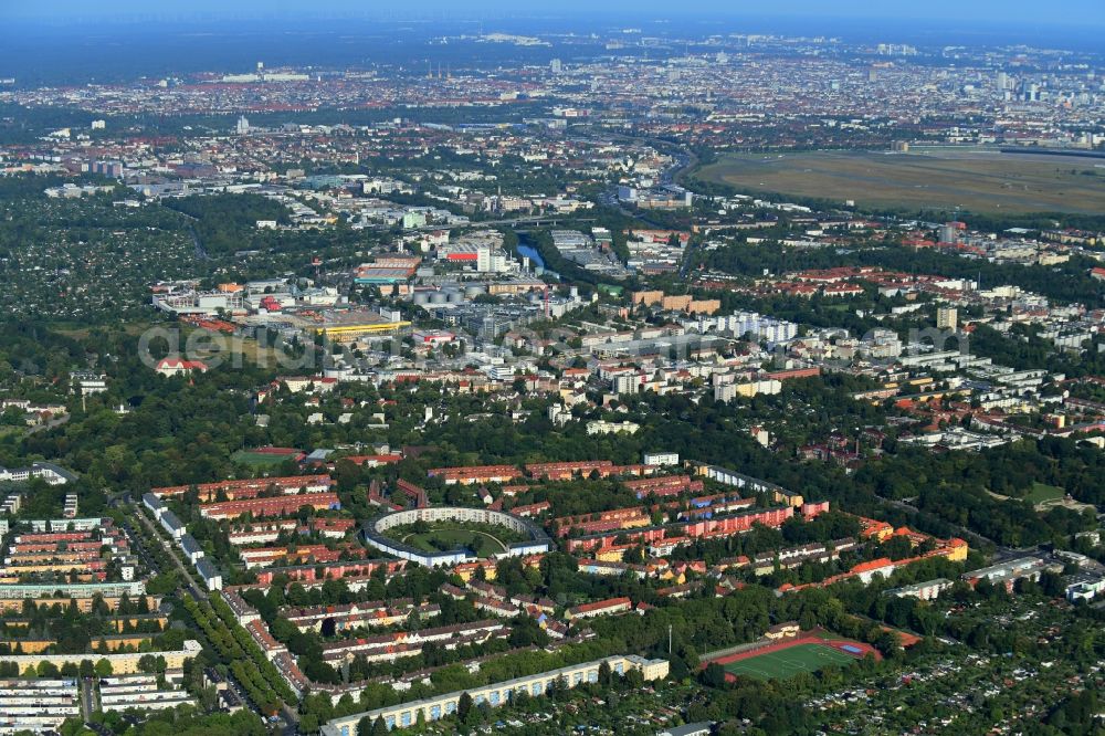 Berlin from the bird's eye view: Residential area of the multi-family house settlement Hufeisensiedlung on Lowise-Reuter-Ring - Fritz-Reuter-Allee in Berlin, Germany