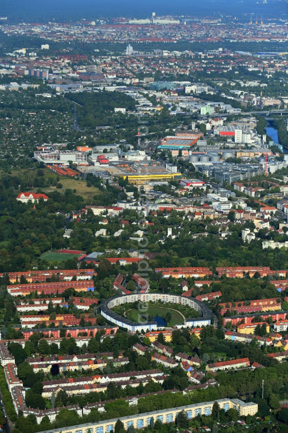 Aerial photograph Berlin - Residential area of the multi-family house settlement Hufeisensiedlung on Lowise-Reuter-Ring - Fritz-Reuter-Allee in Berlin, Germany