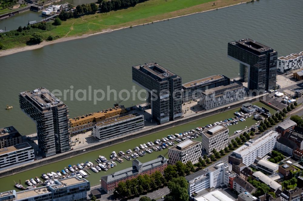 Aerial image Köln - Residential area of a multi-family house settlement Kranhaeuser on the bank and river of the Rhine river in the district Innenstadt in Cologne in the state North Rhine-Westphalia, Germany