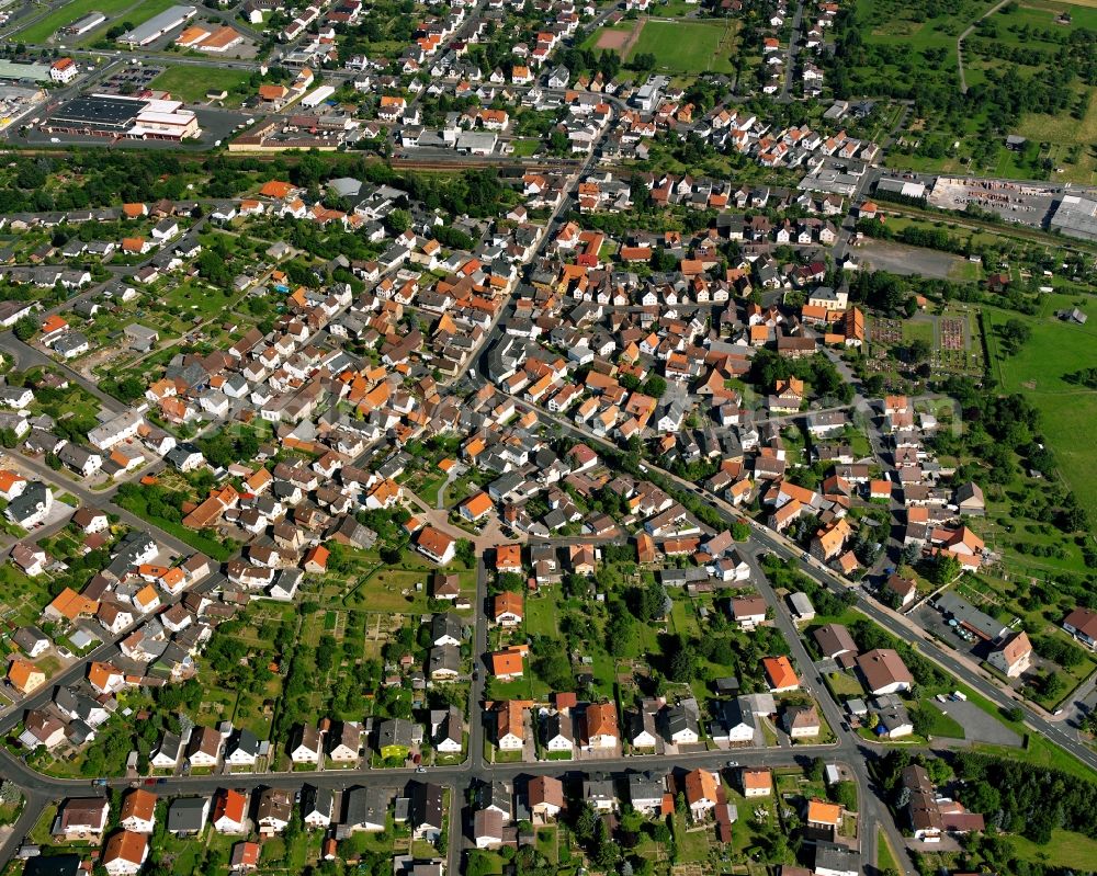 Lindenstruth from the bird's eye view: Residential area of the multi-family house settlement in Lindenstruth in the state Hesse, Germany