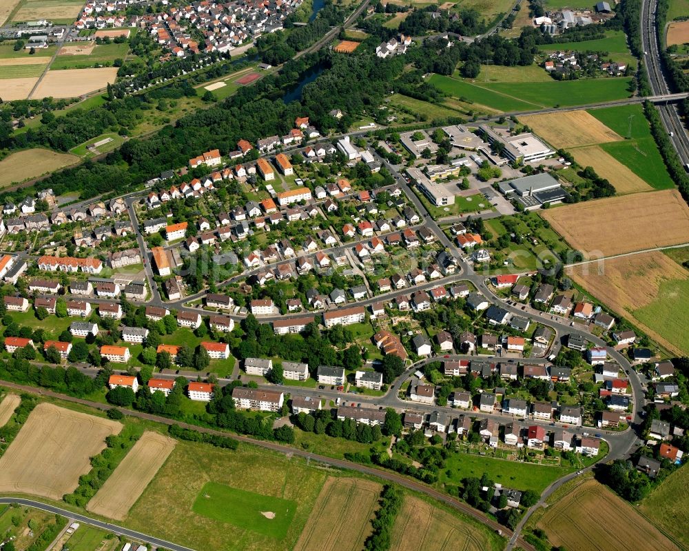 Lollar from the bird's eye view: Residential area of the multi-family house settlement in Lollar in the state Hesse, Germany