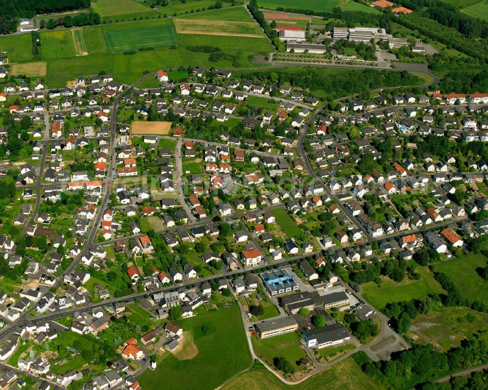 Niederhadamar from the bird's eye view: Residential area of the multi-family house settlement in Niederhadamar in the state Hesse, Germany