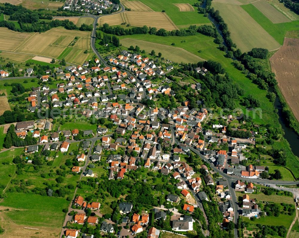 Odenhausen from the bird's eye view: Residential area of the multi-family house settlement in Odenhausen in the state Hesse, Germany