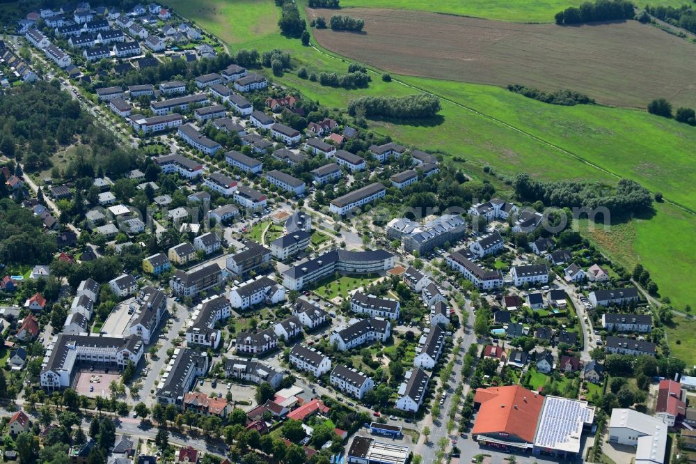 Bergholz-Rehbrücke from the bird's eye view: Residential area of the multi-family house settlement Am Rehgraben in Bergholz-Rehbruecke in the state Brandenburg, Germany