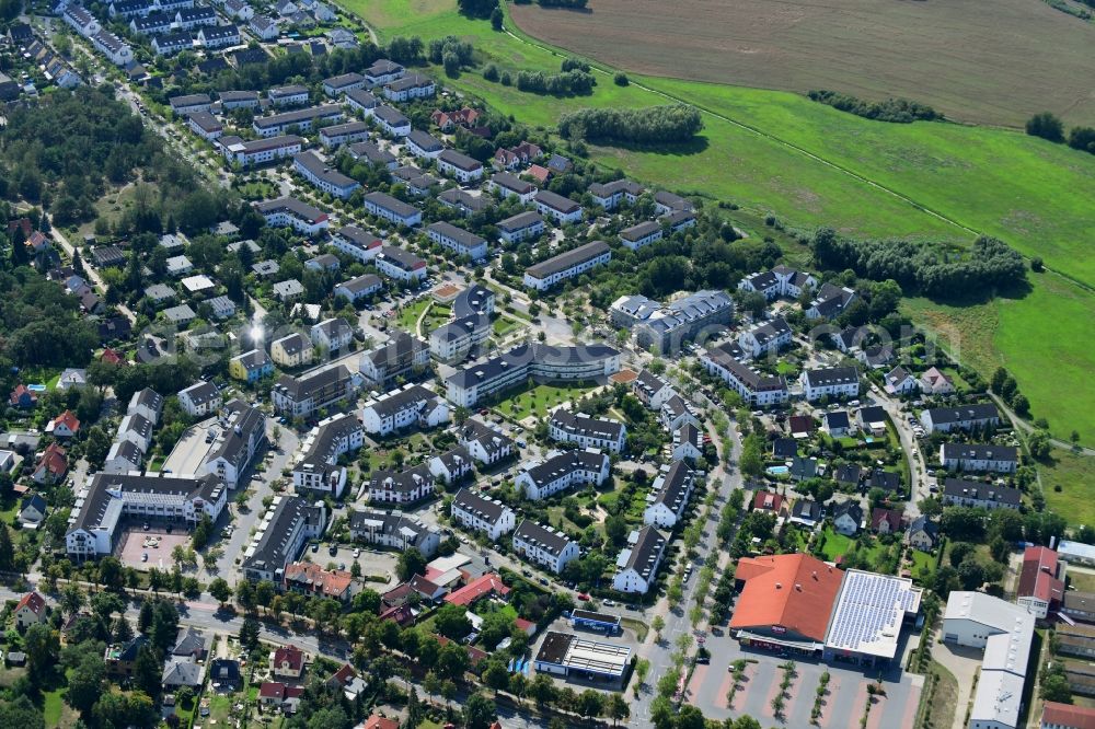 Aerial image Bergholz-Rehbrücke - Residential area of the multi-family house settlement Am Rehgraben in Bergholz-Rehbruecke in the state Brandenburg, Germany