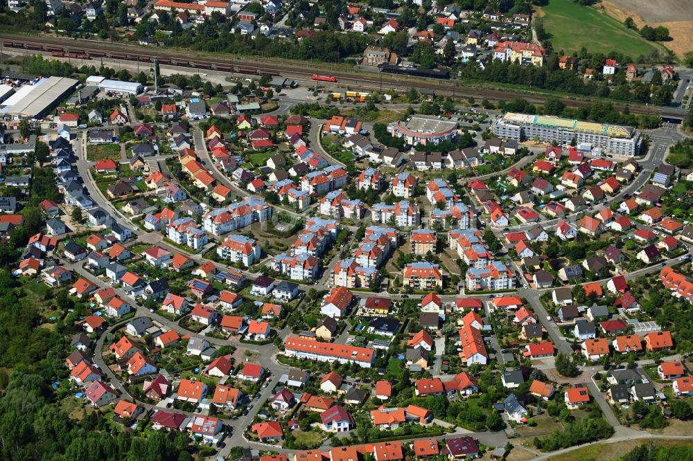 Aerial image Leipzig - Residential area of the multi-family house settlement on Rietzschkebogen - Feldahornweg overlooking the construction site for the new building of a senior citizen residence for age-friendly living on Birkenring - Suedtangente in Leipzig in the state Saxony, Germany