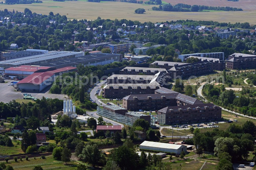 Aerial image Bernau - Residential area of the multi-family house settlement with a sound barrier on street Am Panke-Park in Bernau in the state Brandenburg, Germany