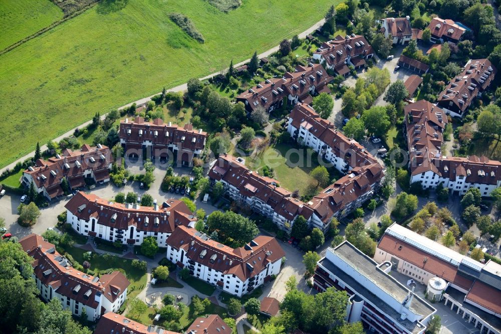 Taufkirchen from the bird's eye view: Residential area of a multi-family house settlement at the Rathausstrasse in Taufkirchen in the state Bavaria